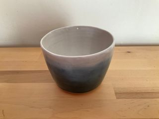 A conic planter glazed with a white to dark blue gradient (top to bottom)