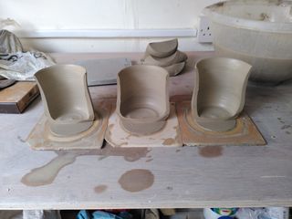 3 halves of mug bodies showing fairly consistent walls