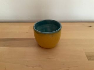A double wall cup, which should keep hands safe from the heat of whatever it contains.

**Note**: The outer wall has a crack at the bottom 😔 Inside is intact and can still contain liquid, though 😊